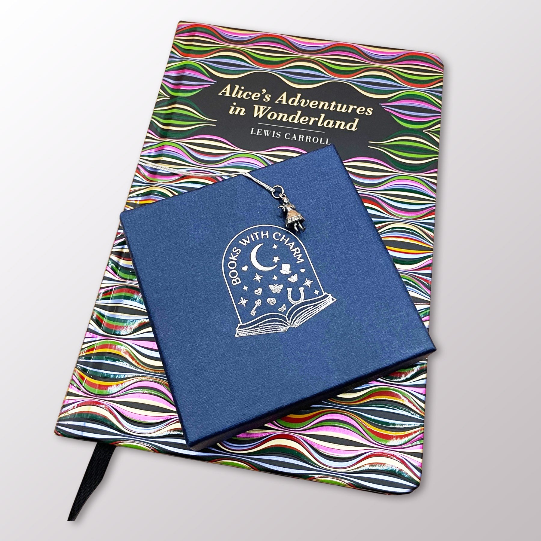 Books with Charm | Alice in Wonderland Hardback Book with Sterling Silver Alice Charm Necklace in a Gift Box | Free UK Delivery