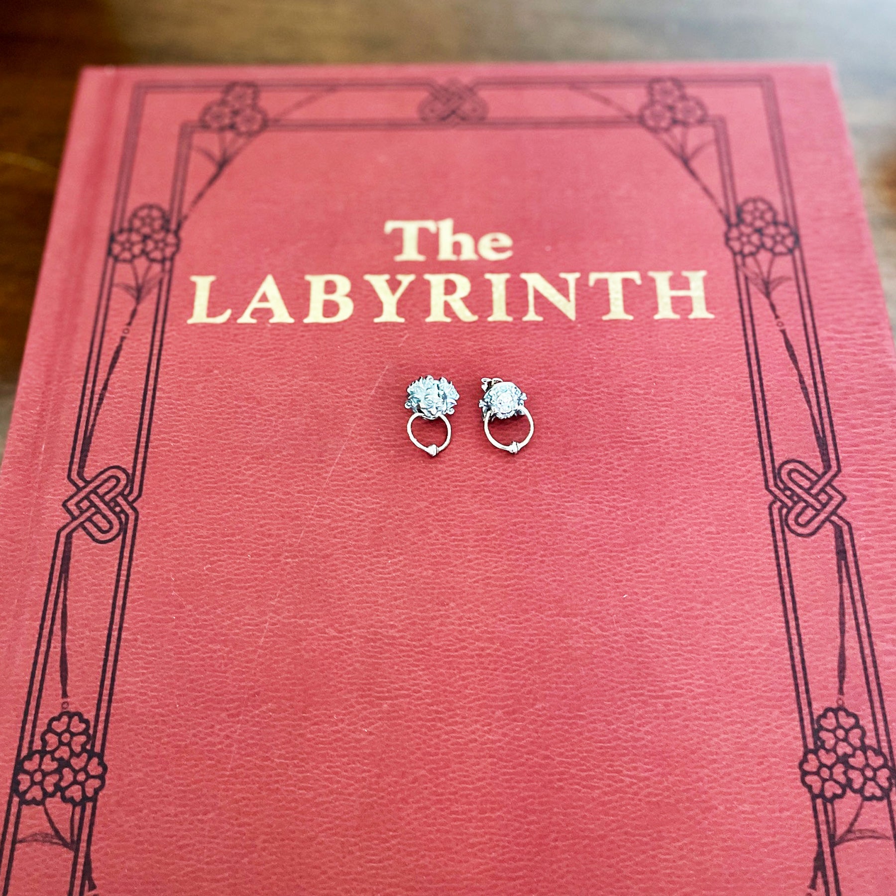 Books with Charm | Jim Henson's Labyrinth Movie A4 hardback illustrated book and Sterling Silver Door Knocker Earrings. Book Gift Sets from £79.95